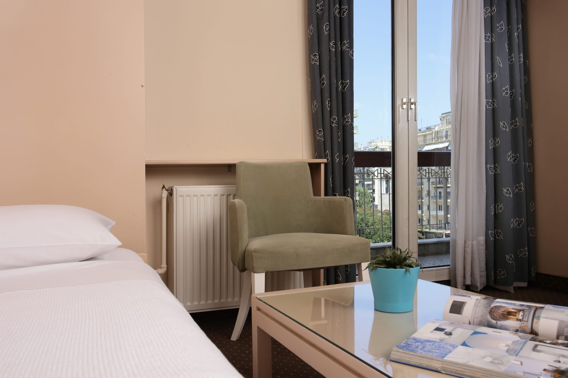 Quadraple Room with Balcony & City View