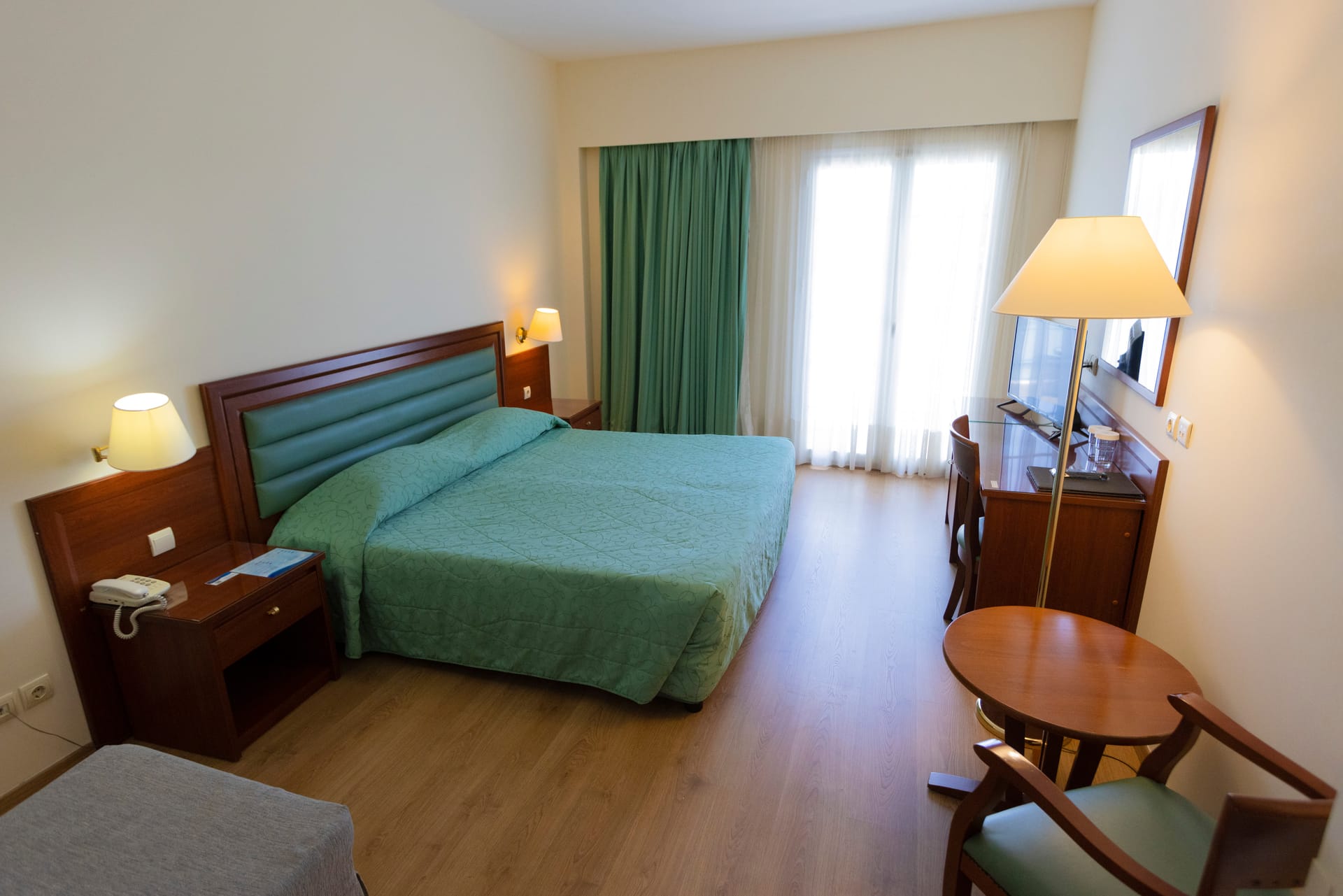 Triple Room (City View or Side Sea View)