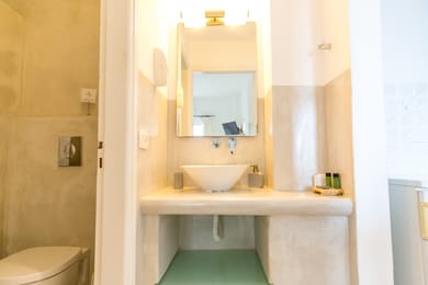 One-Bedroom Apartment with Garden & Village View