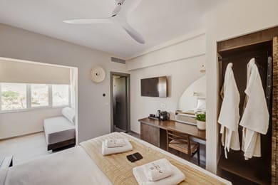 Standard Room with Garden View – No Balcony & Sofa Bed