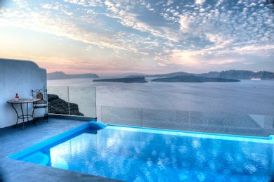Astarte Suite with private infinity pool indoor couples Jacuzzi and private panoramic terrace with sea/caldera/volcano view