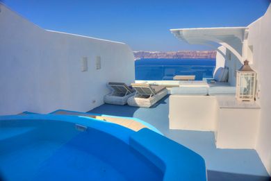 Cave Pool Suite with private cave pool indoor couples Jacuzzi and private panoramic terrace with sea/volcano/caldera views
