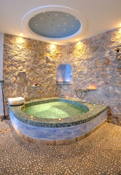 Junior Suite with indoor couples Jacuzzi and private balcony with sea/caldera/volcano view