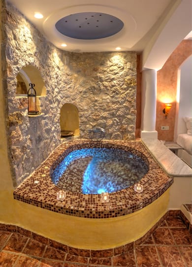 Senior Suite with indoor couples Jacuzzi and private balcony with sea/caldera/volcano view