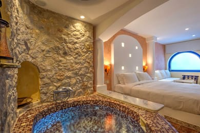 Senior Suite with indoor couples Jacuzzi and private balcony with sea/caldera/volcano view