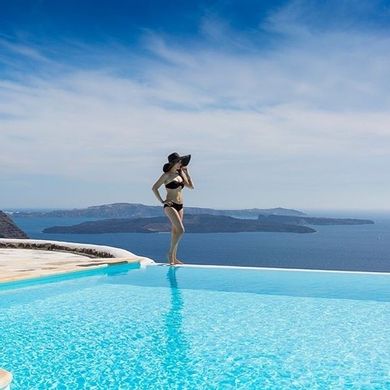 Deluxe Suite with outdoor Jacuzzi & Caldera view