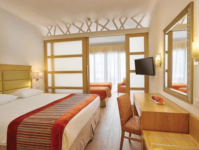 Family Junior Suite with Private Garden and Inland View