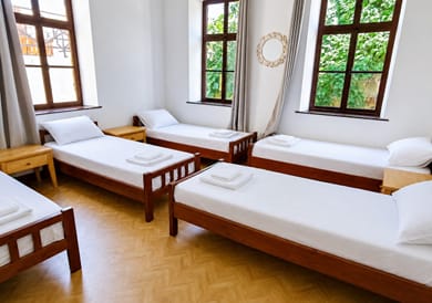 Bed in a Female Dormitory Room