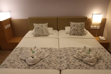 Triple room side sea view