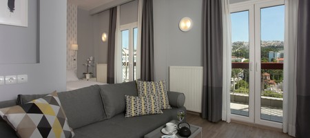 Quadraple Room with Balcony & City View