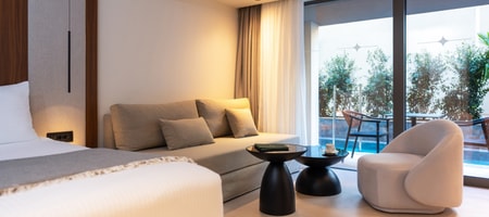 Deluxe Triple Room with Heated Swim Up Pool 32m²