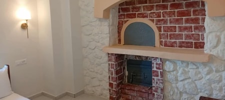 FOURNOS room with Queen bed & partial Seaviews & Balcony