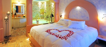 Junior Suite with indoor couples Jacuzzi and private balcony with sea/caldera/volcano view
