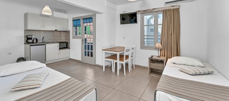 Junior Suite (Quadruple) Bedroom & Living Room
