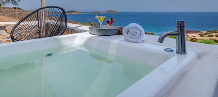 Deluxe Room with outdoor Hot Tub & sea view from the balcony