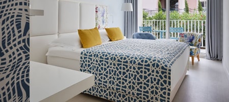 Two Family Rooms with Connecting Door 62m² Courtyard/Park View with Balconies