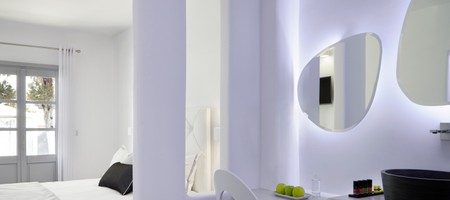 Elegant White Deluxe Room with Private Balcony