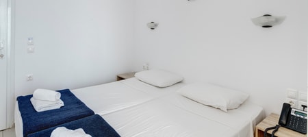 Small Twin Room With A Window To The Corridor