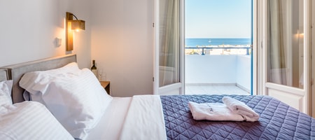 Triple room with balcony and sea view