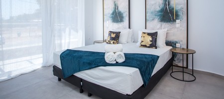 Junior Suite with Side Sea View