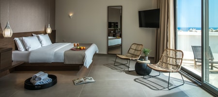 Junior Suite with Outdoor Jetted Tub and Side Sea View