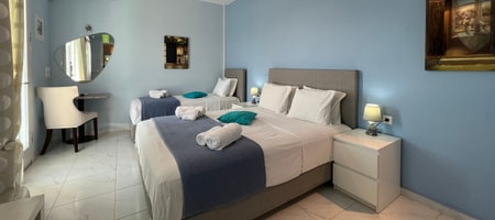 Standard Triple Room with side sea view