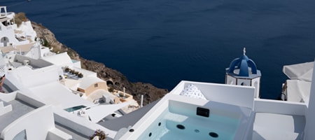 Suite with Outdoor Plunge Pool Balcony and Blue Domes View
