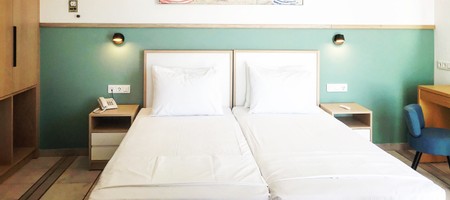 Superior Twin Room with Side Sea View
