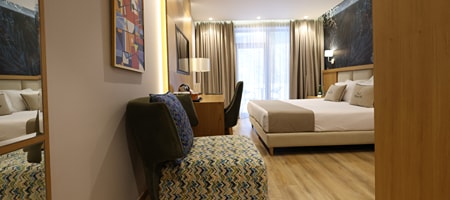 Suite with Balcony and Garden View